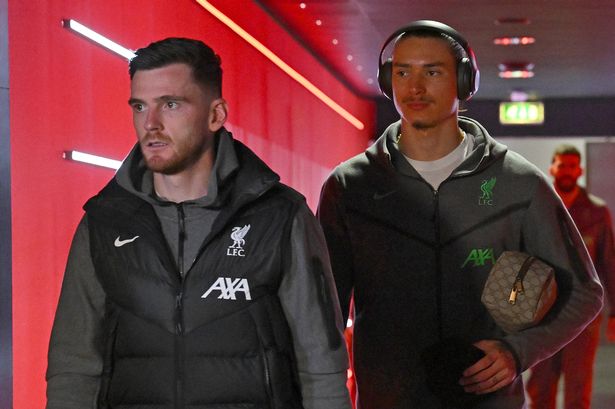 Andy Robertson of Liverpool and Darwin Nunez of Liverpool arrives for the Premier League match between Arsenal FC and Liverpool FC at Emirates Stadium 