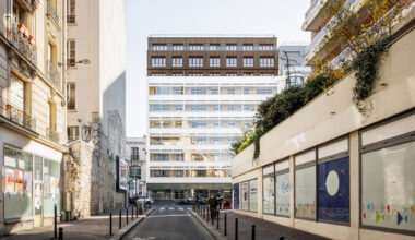 Garage Building into 63 Apartment Building / Atelier Tequi Architects