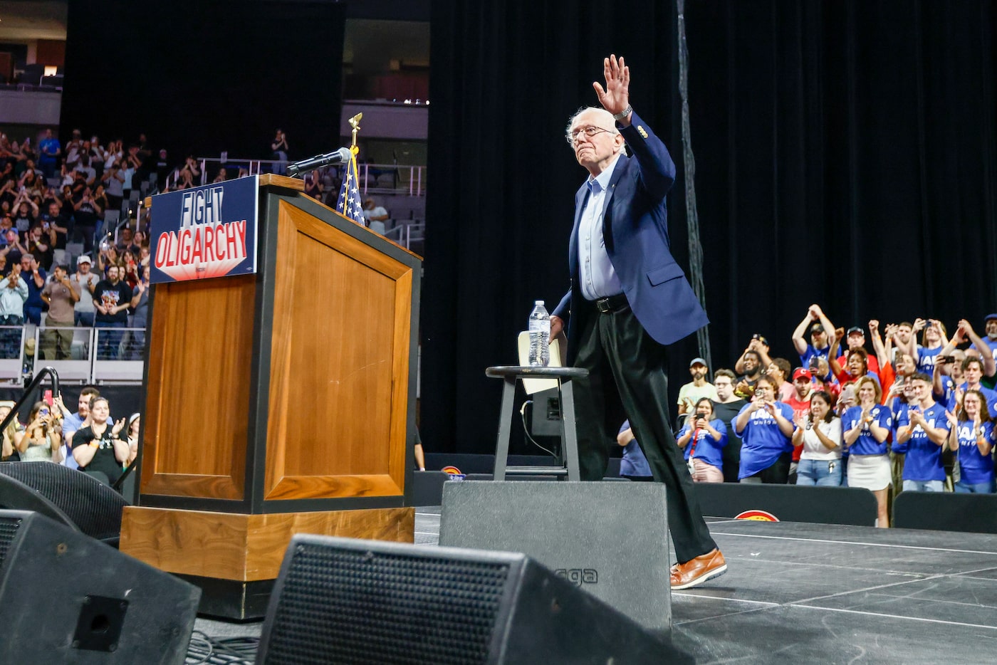 Sen. Bernie Sanders (I-Vt) waves to the crowd as he takes the stage during a ‘Fighting...