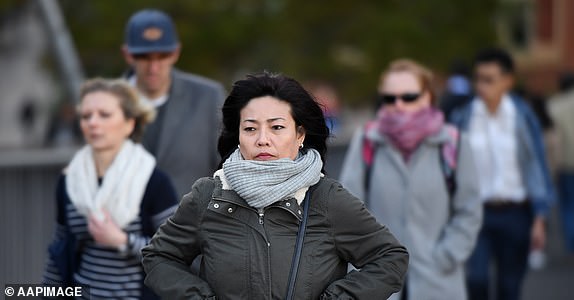 Pedestrians brave the cold in the central business district of Sydney on the first day of winter, Sydney, Friday, June 1, 2018. (AAP Image/Joel Carrett) NO ARCHIVING 13544613  - 13658131  14815187