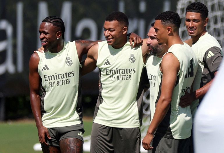 FILE PHOTO: Soccer Football - Club World Cup - Real Madrid Training - Gardens North Country District Park, Palm Beach Gardens, Florida, U.S. - June 15, 2025 Real Madrid's Vinicius Junior, Kylian Mbappe, Dani Carvajal, Trent Alexander-Arnold and Jude Bellingham during training REUTERS/Hannah Mckay/File Photo