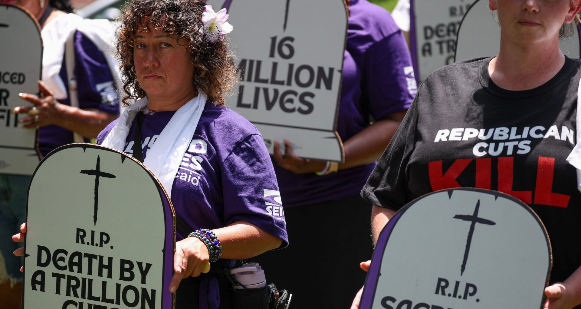 Care workers with the Service Employees International Union (SEIU) participate in a living cemetery protest to denounce the impact to patients, families, and workers if Republicans cut Medicaid, health care, and SNAP to pay for tax cuts for the wealthy at the U.S. Capitol on June 23, 2025, in Washington, D.C.