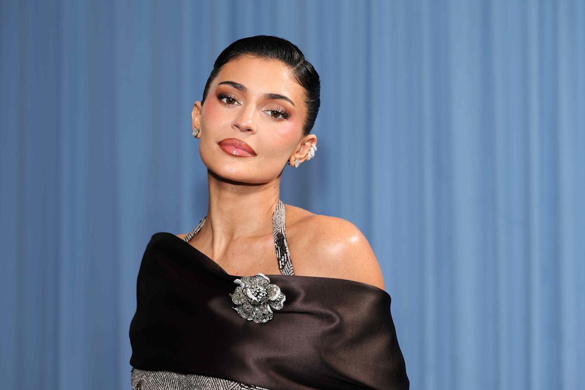 Kylie Jenner’s Daring Bubblegum Pink Minidress Plunges to Her Stomach