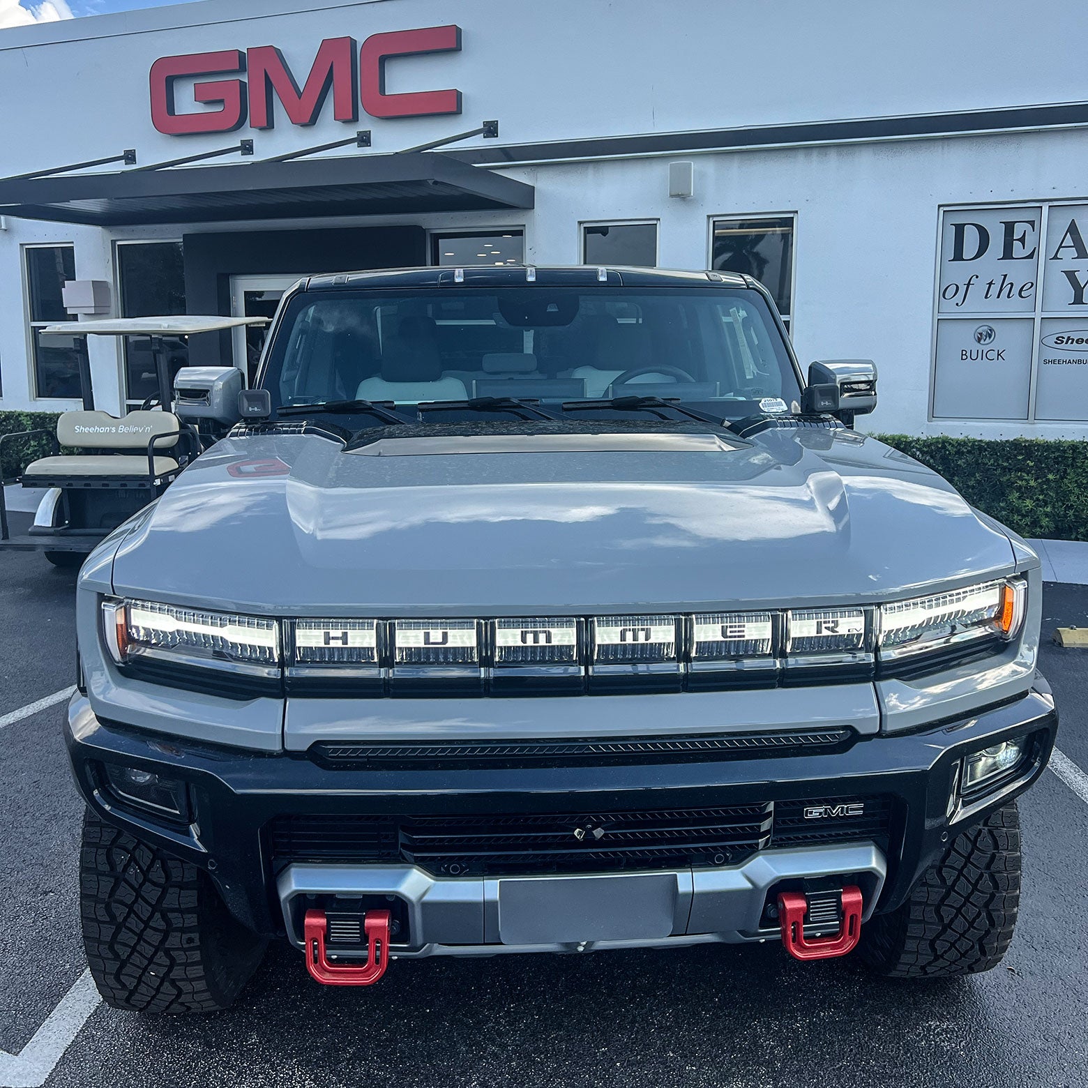 A gray Hummer, from the front.