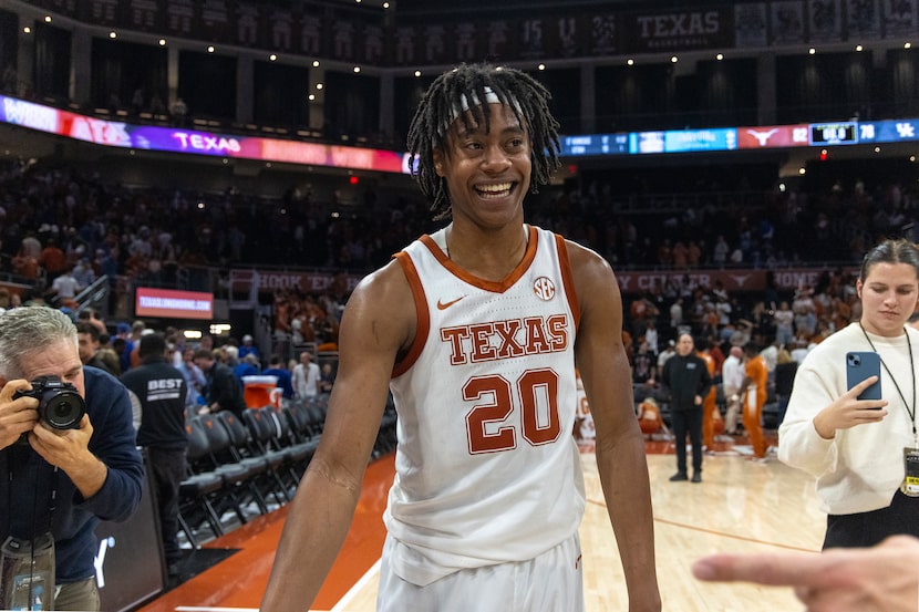 Texas guard Tre Johnson (20) celebrates a win over Kentucky during an NCAA college...