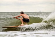 Travis Bible rides a wave on a 9’2 "Local Wizard" by Picnic Surf Shapes on May 3 in...
