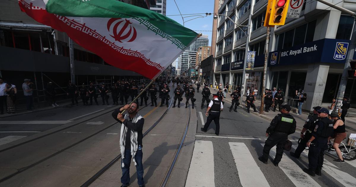 ‘Canadians do not want to see escalations’: Hundreds gather in downtown Toronto to protest war between Israel and Iran - Toronto Star