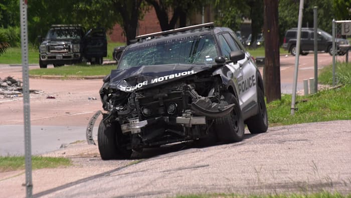 Houston police officers injured in crash, beer cans found thrown from truck