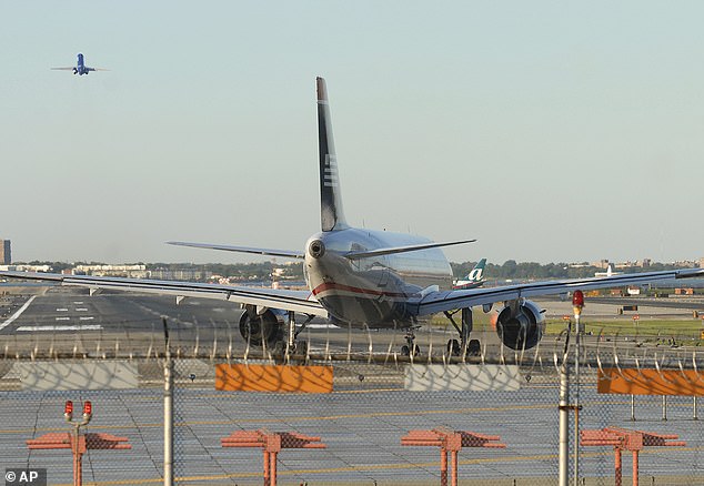 New York City 's LaGuardia Airport LGA issued a ground stop Sunday morning due to severe weather. (Pictured: Airplane on runway at LGA)