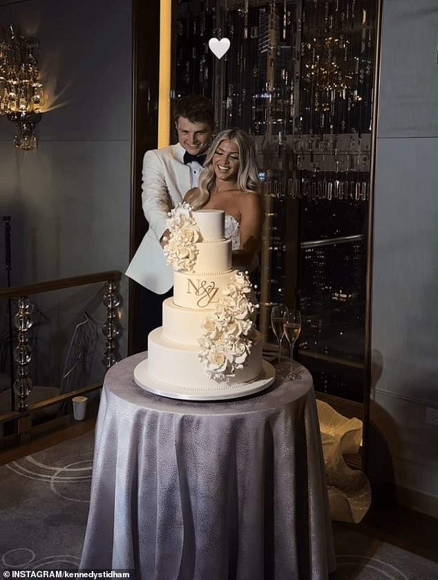 The couple, who met in 2022, looked overjoyed as they cut their cake during their party