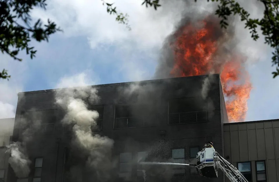 The Fort Worth Fire Department responds to a six-alarm fire at The Cooper apartment complex in the 1000 block of West Rosedale on Monday, June 23.