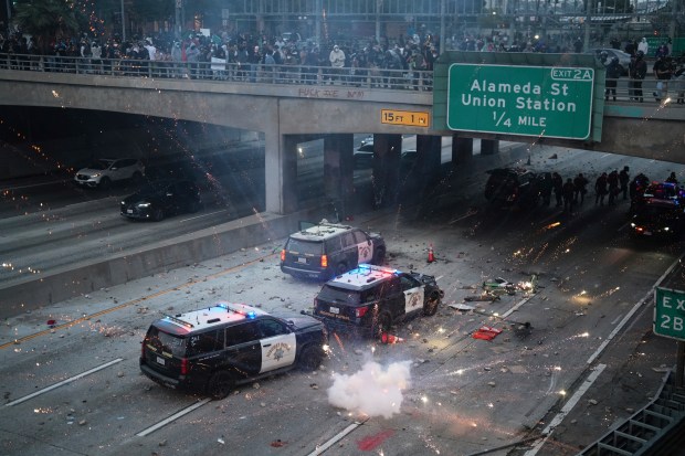 A flash bomb explodes on the 101 Freeway near the...