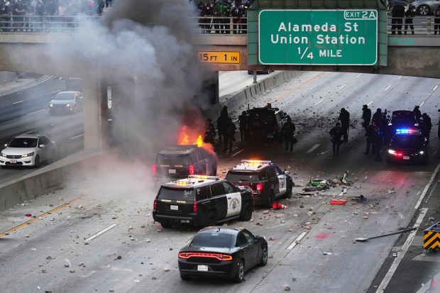 A California Highway Patrol vehical burns on the 101 Freeway...
