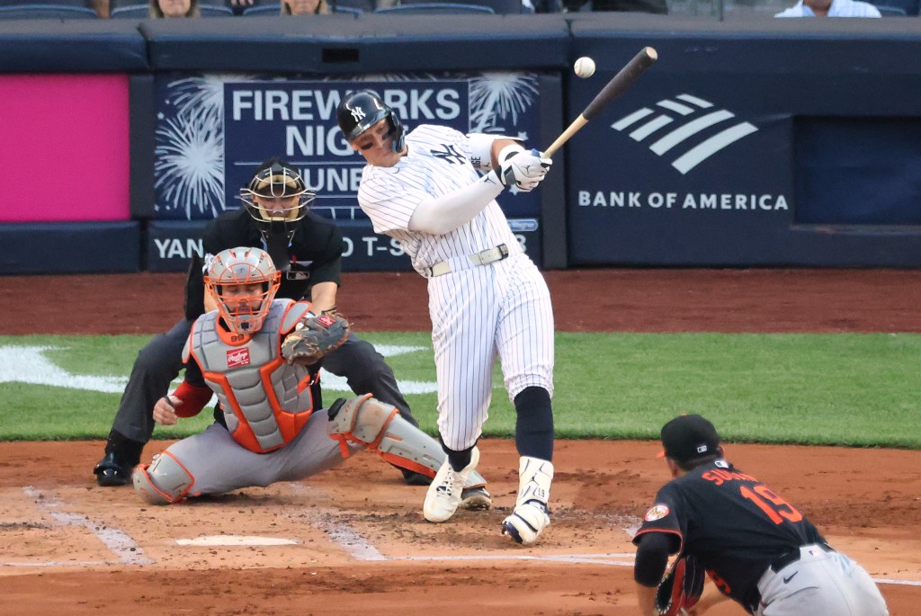 Aaron Judge rips a single during the first inning of the Yankees' loss to the Orioles.