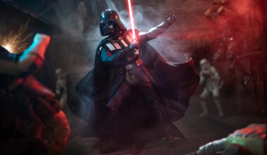 Darth Vader wields a red lightsaber in a dramatic, smoky scene with stormtroopers and other figures in the background, illuminated by red and blue lighting.