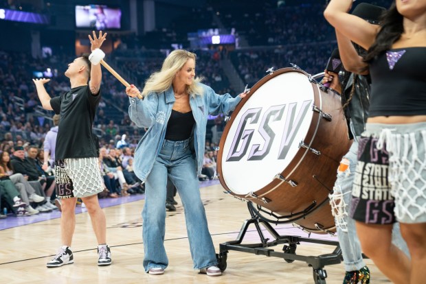 Former US National Women's Soccer team athlete Leslie Osborne leads the crowd in a cheer before the Valkyries compete against the Seattle Storm at the Chase Center in San Francisco, CA on Saturday, June 14, 2025. (Don Feria for Bay Area News Group)