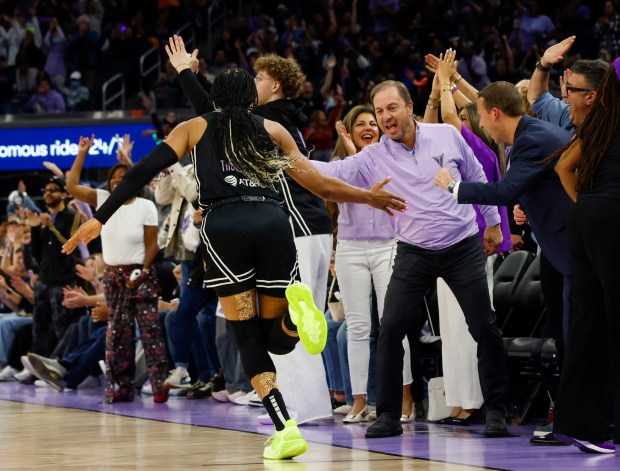 Golden State Valkyries' Kayla Thornton (5) high fives Joe Lacob, owner of the Golden State Valkyries, during a game against Chicago Sky in the fourth quarter at the Chase Center in San Francisco, Calif., on Friday, June 27, 2025. (Shae Hammond/Bay Area News Group)