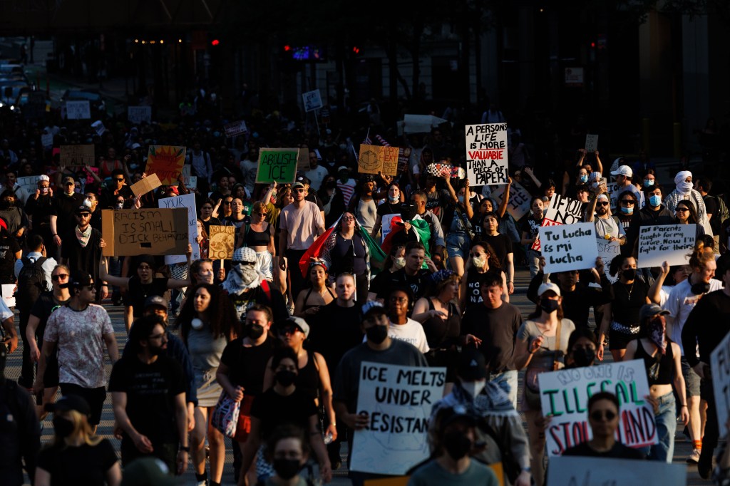 Chicago woman detained for driving through crowd of protesters, police in the Loop