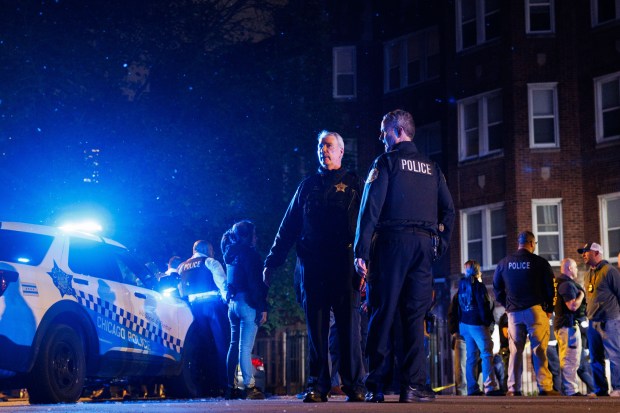 Police work the scene where Officer Krystal Rivera was fatally...