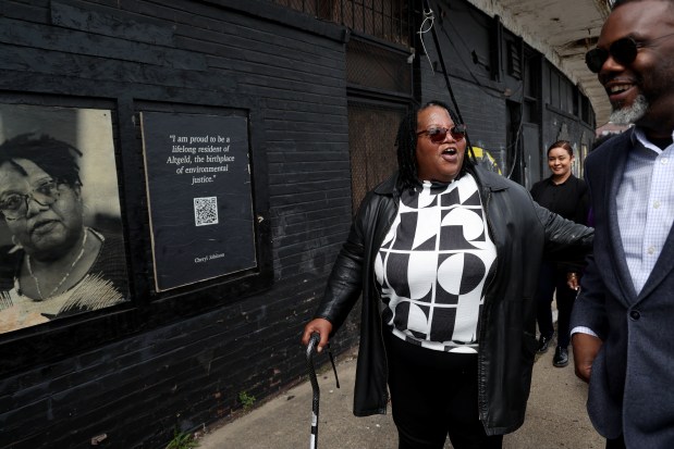 People for Community Recovery executive director Cheryl Johnson, leads the way as she, Mayor Brandon Johnson, and others participate in the Earth Day Tour at the Altgeld Gardens Public Housing community on April 22, 2025. (Antonio Perez/Chicago Tribune)