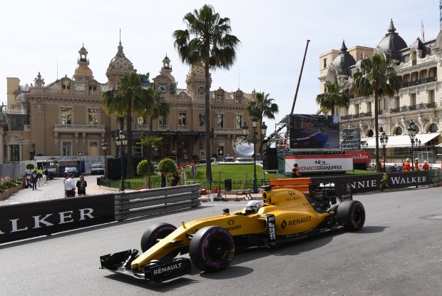 Renault Team's Danish driver Kevin Magnussen drives past the Monte Carlo Casino during a practice run for the Monaco Grand Prix in Monaco on May 26, 2016. (Pascal Guyot/Getty-AFP)