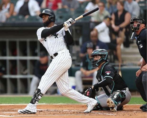 Chicago White Sox center fielder Luis Robert Jr. watches the flight of his solo home run in the second inning of a game against the Arizona Diamondbacks at Rate Field in Chicago on June 24, 2025. (Chris Sweda/Chicago Tribune)