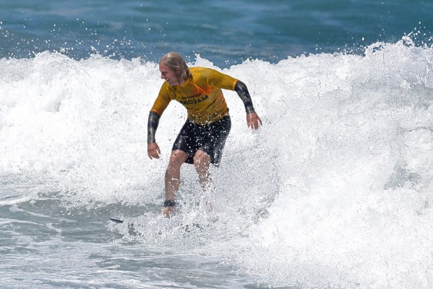 A surfer competes at the 2025 Bro-Am Beachfest (Jon Clark)