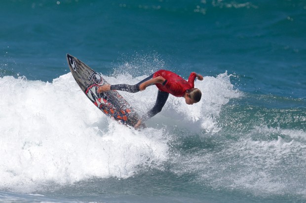 A surfer competes at the 2025 Bro-Am Beachfest (Jon Clark)