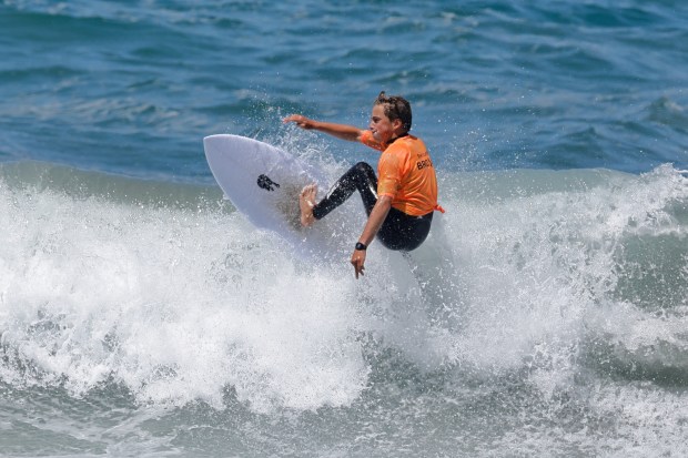 A surfer competes at the 2025 Bro-Am Beachfest (Jon Clark)