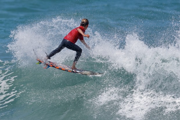 A surfer competes at the 2025 Bro-Am Beachfest (Jon Clark)