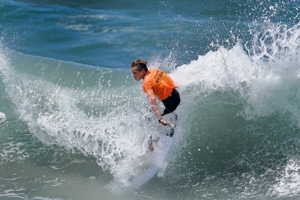 A surfer competes at the 2025 Bro-Am Beachfest (Jon Clark)