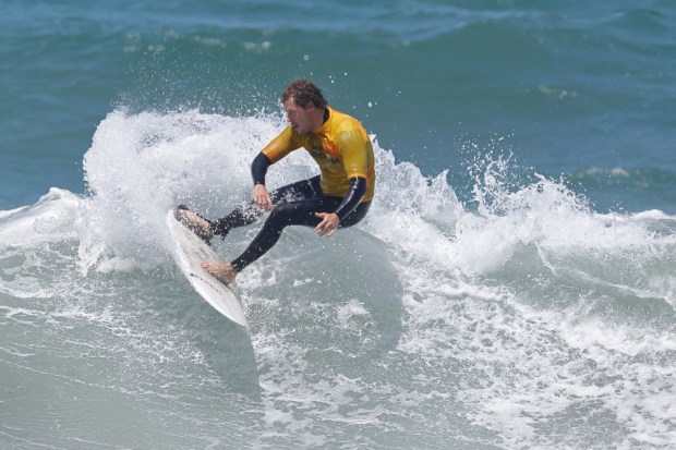 A surfer competes at the 2025 Bro-Am Beachfest (Jon Clark)