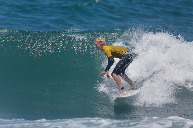 A surfer competes at the 2025 Bro-Am Beachfest (Jon Clark)