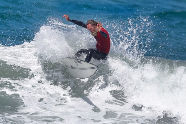 A surfer competes at the 2025 Bro-Am Beachfest (Jon Clark)