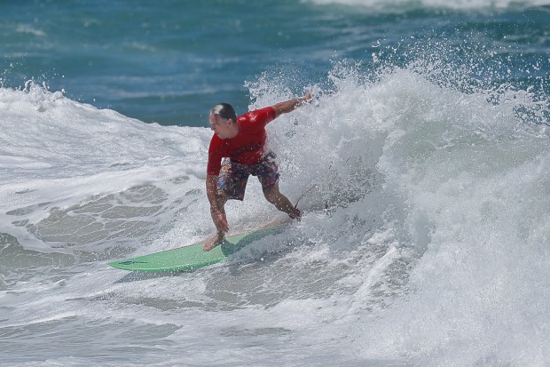 A surfer competes at the 2025 Bro-Am Beachfest (Jon Clark)