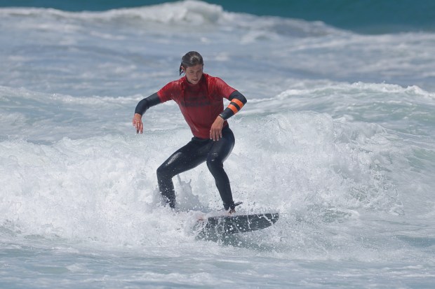A surfer competes at the 2025 Bro-Am Beachfest (Jon Clark)