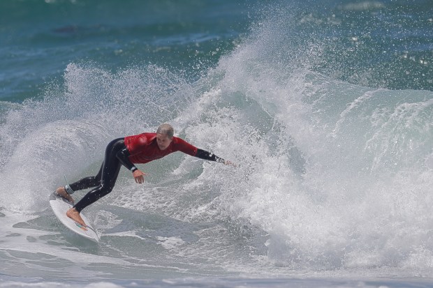 A surfer competes at the 2025 Bro-Am Beachfest (Jon Clark)