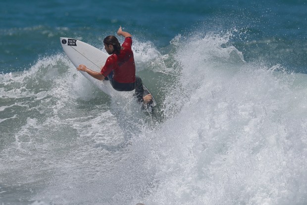 A surfer competes at the 2025 Bro-Am Beachfest (Jon Clark)