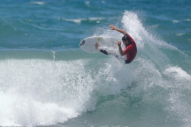 A surfer competes at the 2025 Bro-Am Beachfest (Jon Clark)