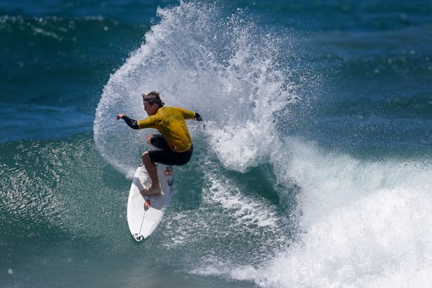 A surfer competes at the 2025 Bro-Am Beachfest (Jon Clark)