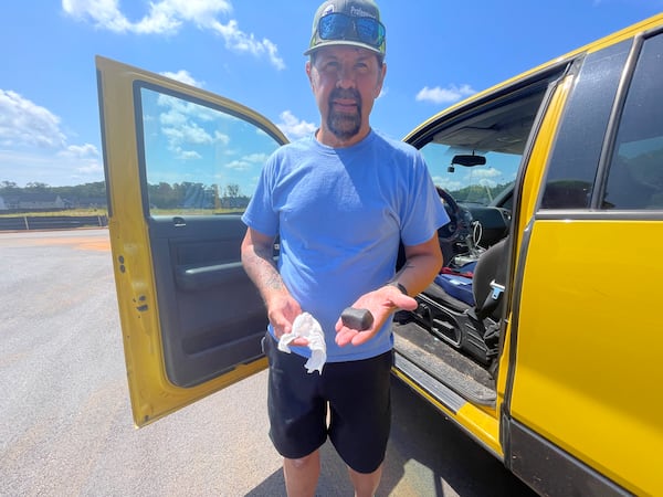 Steve Arnold, star of the TV show "Meteorite Men," holds the largest chunk of the Georgia fireball found to date.