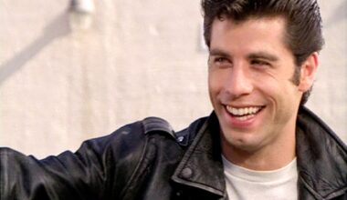 John Travolta Makes Appearance In Blond Wig As Danny Zuko At Hollywood Bowl