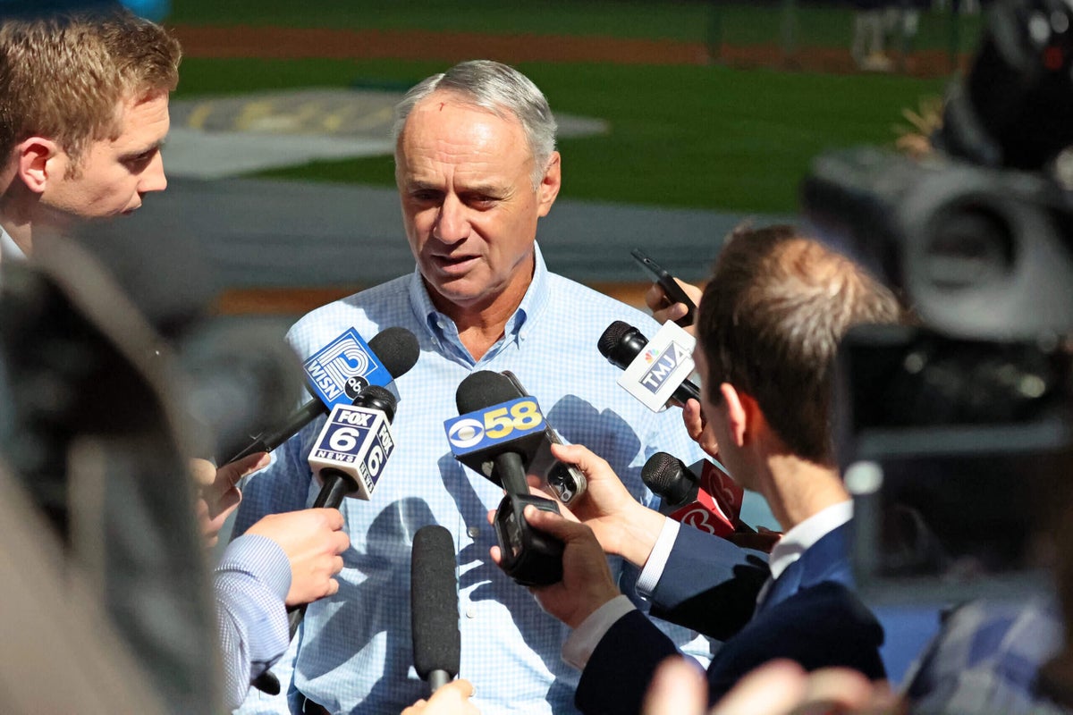 Rob Manfred has a plan: Tell players they’ve lost billions, and build their trust in him