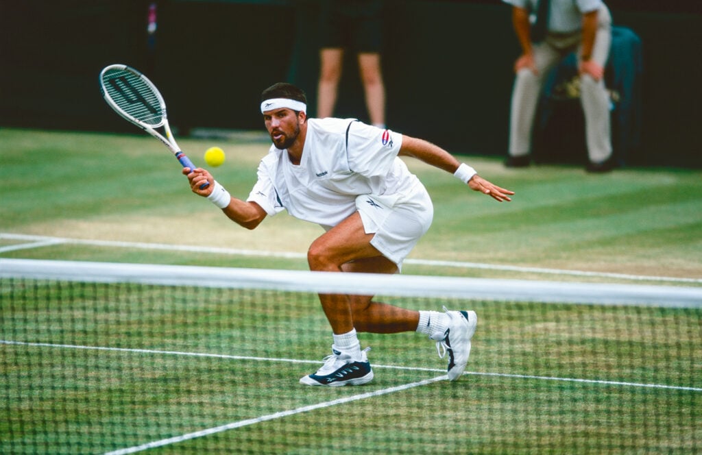 Pat Rafter playing on Centre Court at Wimbledon