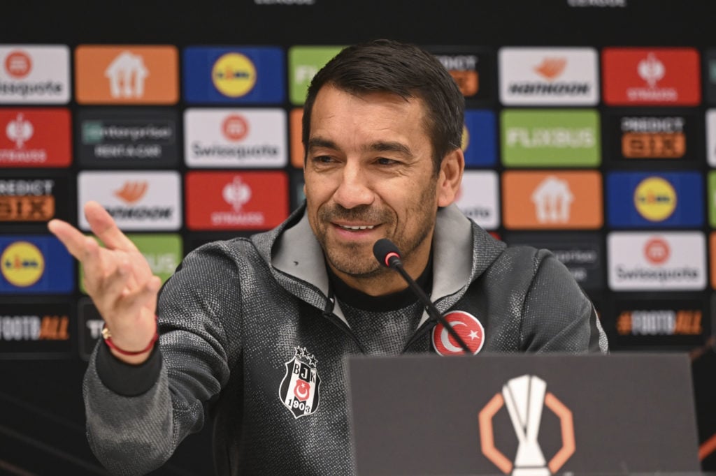 Besiktas manager Giovanni van Bronckhorst conducts a press conference ahead of the UEFA Europa League match against Maccabi Tel Aviv