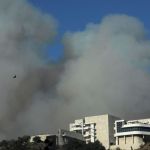 BRENTWOOD, CA - JANUARY 11, 2025 - - The Palisades Fire cloaks The Getty Center in Brentwood on January 11, 2025. (Genaro Molina/Los Angeles Times via Getty Images)