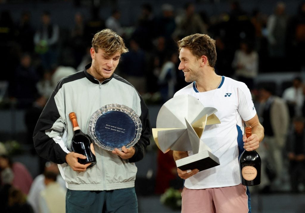 Jack Draper and Casper Ruud pose with their trophies after the 2025 Madrid Open final