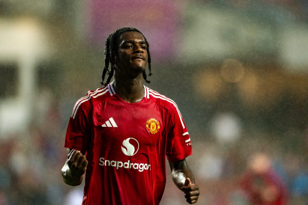 Ayden Heaven celebrates after scoring during a game between Manchester United and Hong Kong.