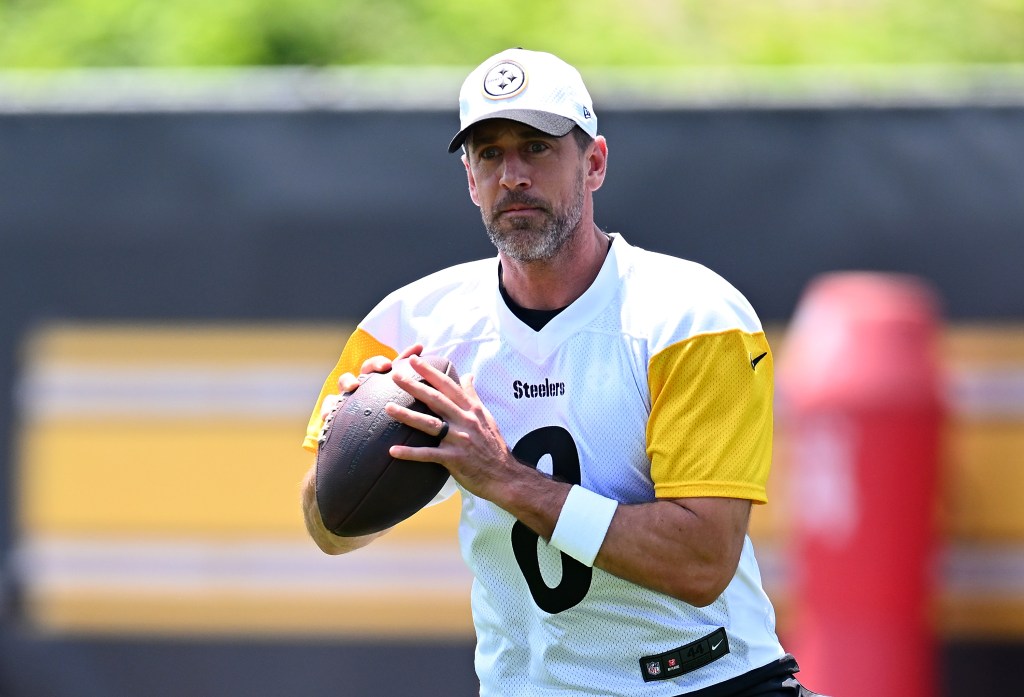 Aaron Rodgers looks to pass during Minicamp at UPMC Rooney Sports Complex on June 11, 2025 in Pittsburgh, Pennsylvania.