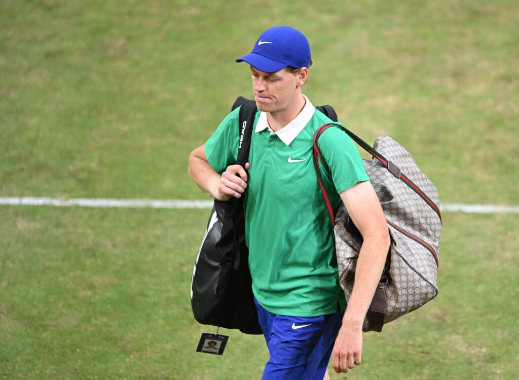 Jannik Sinner leaving the court after losing to Alexander Bublik at the Halle Open.